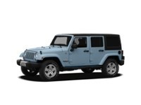 2012 Jeep Wrangler Unlimited 4WD 4dr Sahara Winter Chill Pearlcoat  Shot 11